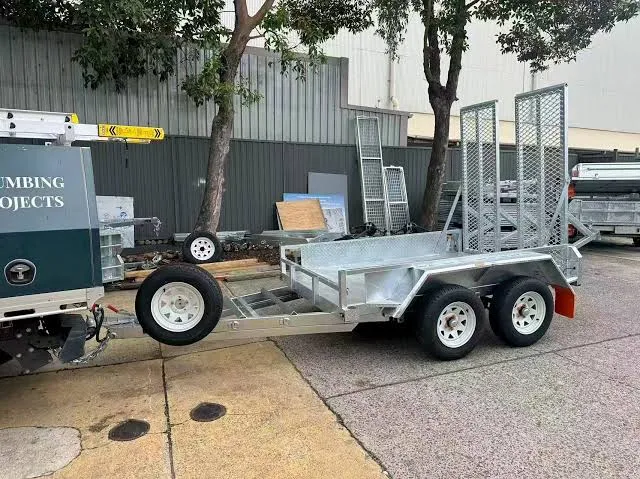 Galvanised plant trailer in everyday tradie use